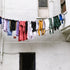 clothes drying hanging on clothing line dryer